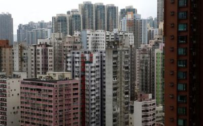 China’s economic woes mount as trust firm misses payments, home prices fall