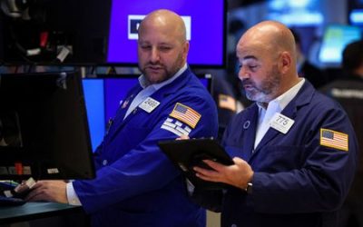 US stocks rally as Fed holds rates, prompts hope for end to hikes