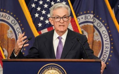 Fed flags end of rate hikes, sees lower borrowing costs in 2024