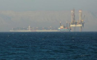 Oil settles up on Red Sea tensions; gains capped by US stock builds