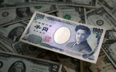 Yen rises as investors eye Japan policy move; bitcoin soars to new record